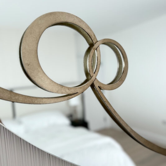 Contemporary Twisted Oval Mirror designer gold metal pattern on a mirror