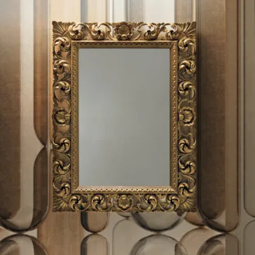 The Ornate Baroque Style Wall Mirror, showcasing its intricate floral and scroll designs, hangs empty on a patterned wall. The mirror's gold frame contributes an elegant touch to the setting.