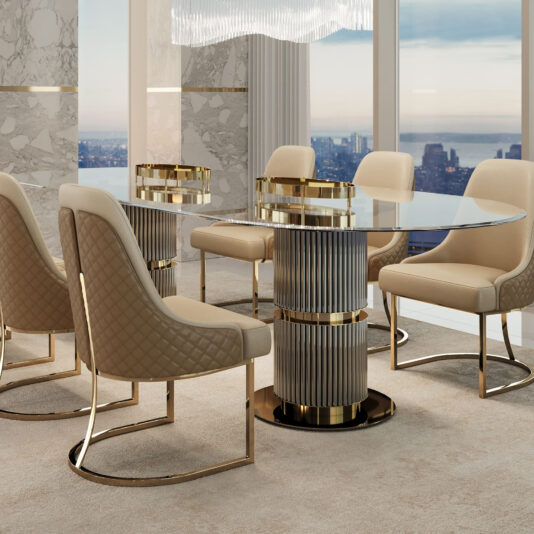 A luxurious dining room showcases a Contemporary Oval Glass Dining Table, encircled by six beige quilted chairs with gold accents. Elegantly designed, the space is enhanced by marble walls and offers a panoramic city view through floor-to-ceiling windows.