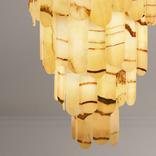 Modern Onyx Tiered Ceiling Light Close-up of the Modern Onyx Chandelier featuring layered, translucent stone-like panels in warm yellow and brown hues, elegantly creating a luminous effect beneath a neutral ceiling.