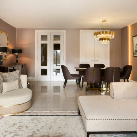 An elegant dining and living area features a round chair, sofa, glossy tiles, ai-designed furniture including dark styled dining table and chairs with gold accents, and mirrored sideboard. Neutral tones with gold accents enhance sophistication, while the Modern Smoked Cut Crystal Chandelier adds an exquisite touch.