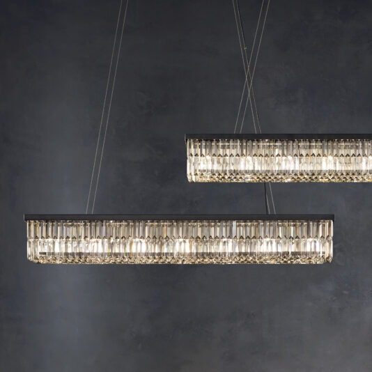 Two Modern Smoked Cut Crystal Chandeliers hang sleekly from the ceiling against a dark, textured backdrop, emitting a soft, ambient glow that highlights their elegant design.