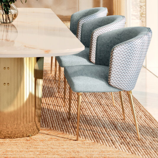 The Large Modern Marble Dining Set boasts a glossy tabletop and gold base, paired with three gray chairs featuring textured backs and gold legs. This elegant ensemble is set on a ribbed beige rug in a sunlit room.