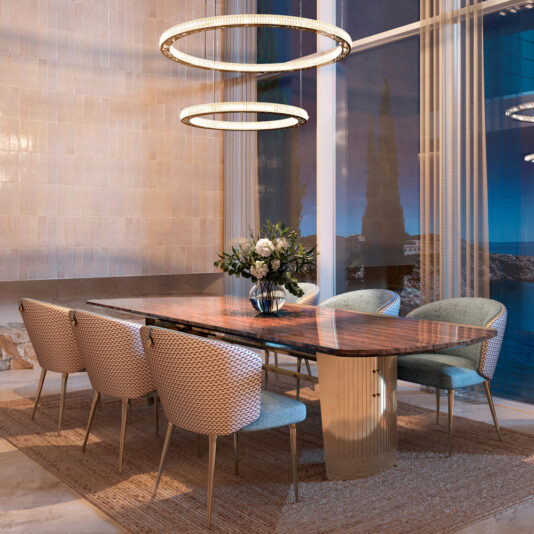 A luxurious dining room showcases the Large Modern Veneered Dining Set, complete with a polished wooden table and elegant chairs. Central to the table is a vase of white flowers. Overhead, two circular pendant lights illuminate the scene, while large windows reveal an evening view of trees and water.