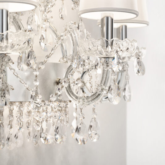 Close-up of the Classic Style Clear Crystal Chandelier (Copy) featuring sparkling glass pendants, elegant curved arms, and white fabric lampshades for a luxurious and sophisticated look.