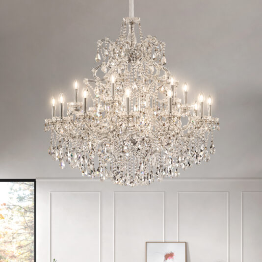 The Contemporary Tiered Crystal Chandelier hangs in a bright, elegant room with white paneled walls, adding a striking modern touch to the ornate decor.