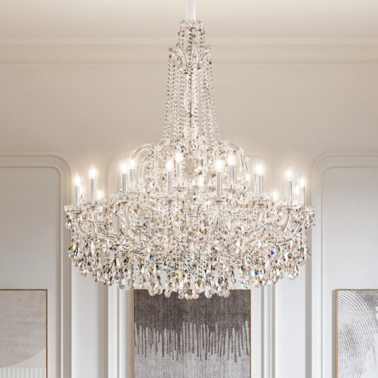 The Traditional Style Crystal Chandelier (Copy) features multiple tiers and candle-like bulbs, hanging from a white ceiling and sparkling against a neutral wall with abstract art.