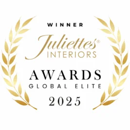 A gold laurel wreath surrounds the text: "Winner Juliettes Interiors Global Elite Award 2025" on a white background.