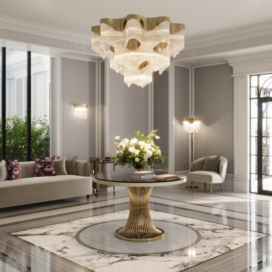 Contemporary Wavy Tiered Chandelier Elegant living room featuring the Contemporary Wavy Tiered Chandelier, a round table with floral arrangement, marble floor with circular inlay, gray walls, and a beige sofa with red cushions by large windows.