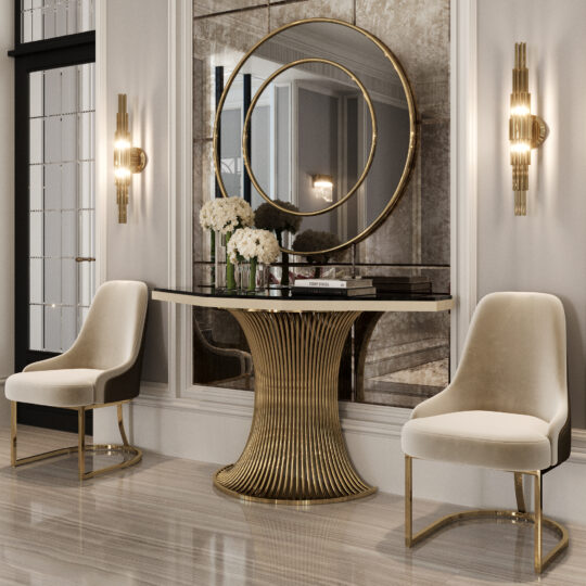 Elegant entryway with two beige velvet chairs, a Marble Demi Console (Copy), white flowers in vases, circular mirrors, and gold wall sconces on either side, creating a modern, luxurious interior design.