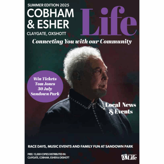 Magazine cover featuring “Cobham & Esher Life” with a photo of Tom Jones singing, promoting a ticket giveaway for his July 30 show at Sandown Park. Headlines highlight community life, local news, events, and the spirit of connection.
