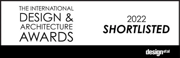 A black and white banner reads "The International Design & Architecture Awards 2022 Shortlisted," showcasing its award-winning status, with the logo "design et al" in the bottom right corner.