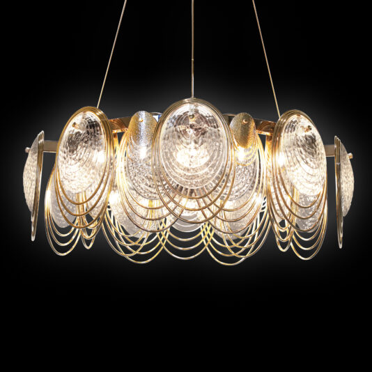 The Large Leaf Chandelier With Crystal Drops (Copy) features concentric gold rings, crystal drops, and textured glass discs. It emits bright white light and is suspended dramatically against a black background.