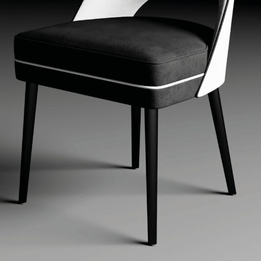 The Contemporary Dual-Tone Dining Chair showcases a sleek black and white design, making it an ideal choice for modern interiors.