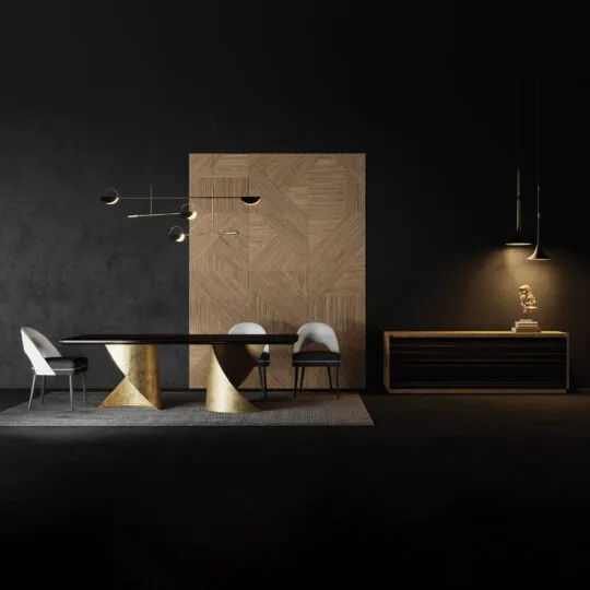 A modern dining room with a dark palette showcases the Contemporary Ebony Veneered Dining Table (Copy) with gold geometric bases, four chairs, a wood-paneled wall, a sideboard with books, and bold contemporary pendant lighting.