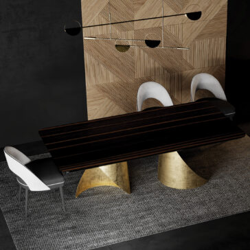 A modern dining area showcases the Contemporary Ebony Veneered Dining Table with gold pedestal bases, three white chairs, geometric wood paneling, and a black and gold minimalist pendant light for a stylish finish.