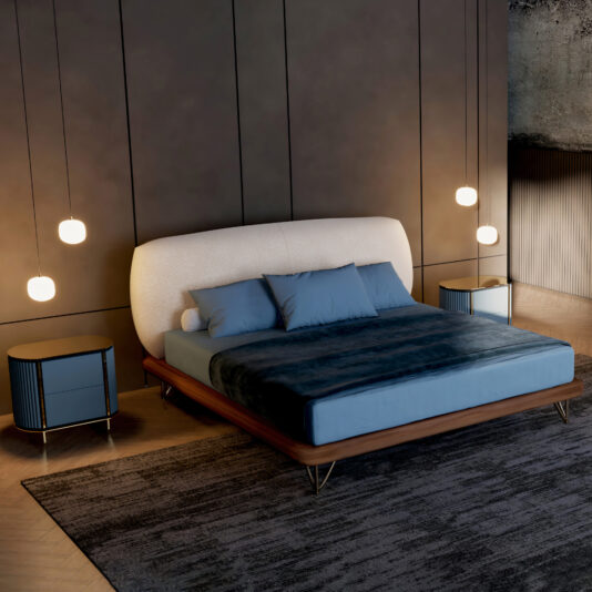 A modern bedroom boasts a large bed with blue bedding, a curved white headboard, two Contemporary Lacquered Curved Bedside Cabinets, five round pendant lights, all atop a dark rug over a wooden floor.
