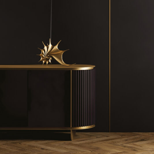 Contemporary Lacquered Curved Sideboard A Contemporary Lacquered Curved Sideboard with gold trim stands on a wooden floor, topped with a sculptural gold decor piece, against matching black and gold walls.