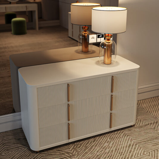 The Contemporary Ribbed Lacquered Bedside Cabinet (Copy) functions as a sleek white dresser with space for two lamps, bringing modern elegance to your room.