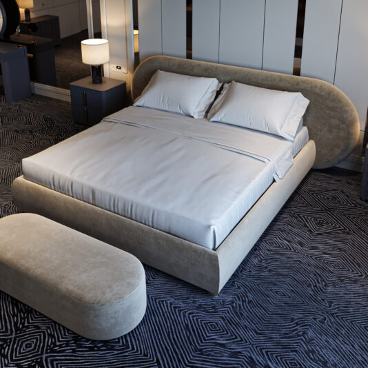 A modern bedroom features a large beige upholstered bed with white bedding and pillows, a matching bench, Modern Ribbed Lacquered Bedside Drawers (Copy) topped with lamps, and a geometric patterned carpet.