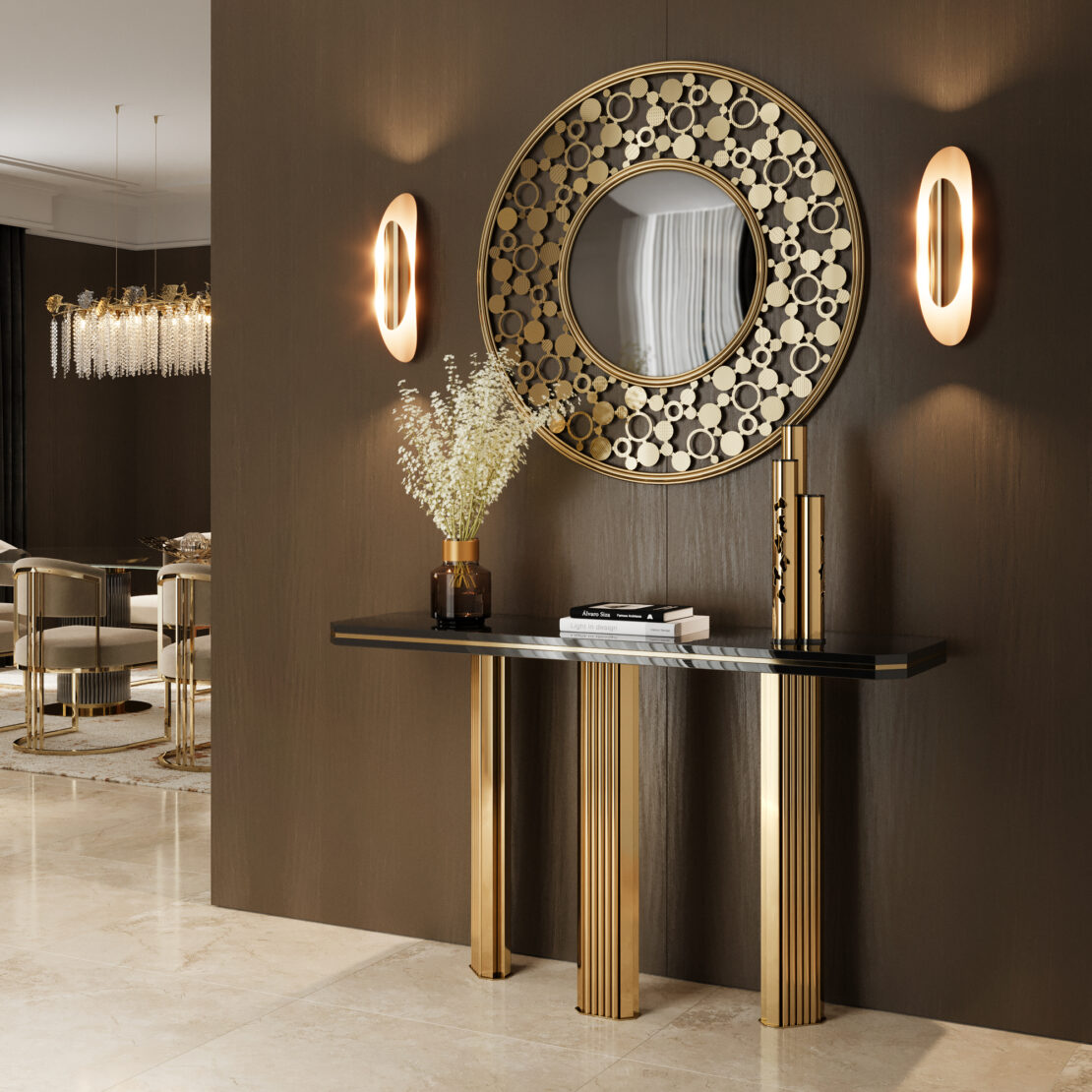 A stylish entryway displays the Modern Round Convex Mirror above a black and gold console table, flanked by two sleek wall sconces and a vase of white flowers, set against a brown wall with a view of an elegant dining area.