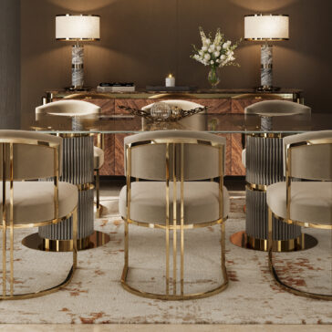 Modern Oval Glass Dining Table A modern dining room showcases a Contemporary Oval Glass Dining Table, gold and beige upholstered chairs, a patterned rug, and a wooden sideboard with two lamps, a vase of white flowers, and decor accents.