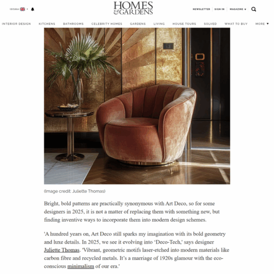 A screenshot from a Home & Gardens article that shows a luxurious rounded armchair with peach velvet upholstery and gold base sits on a circular rug in a stylish room with dark walls and tall windows. The article features Juliette's Interiors.