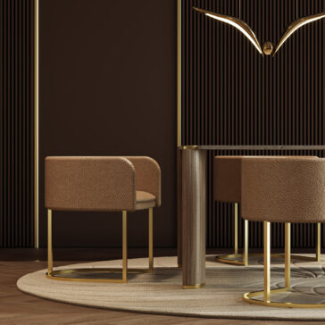 Contemporary Rectangular Stone Dining Table A modern interior featuring brown and gold chairs, the Contemporary Rectangular Stone Dining Table with wooden legs, a round beige rug, dark vertically-lined walls, and a gold decorative wall sculpture.
