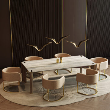 Contemporary Rectangular Stone Dining Table A modern dining room showcases a Contemporary Rectangular Stone Dining Table, six beige chairs with gold legs, a round beige rug, and three gold bird-shaped pendant lights above the table against a dark-panelled wall.