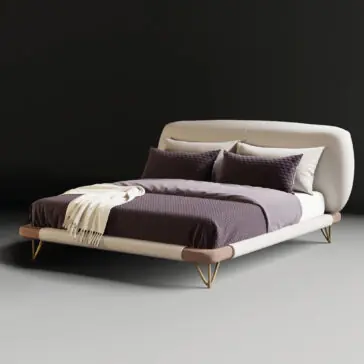 High End Contemporary Italian Bed The High-End Contemporary Italian Bed features a curved upholstered headboard, dark bedding, a cream throw blanket, slim gold-finished legs, and is showcased against a plain black background for a stylish minimalist look.