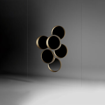 Modern Floating Wall Mirror Cluster The Modern Floating Wall Mirror Cluster features six round, hollow mirrors with gold rims arranged in a honeycomb pattern, floating against a gradient gray background and casting soft shadows on the wall and floor.