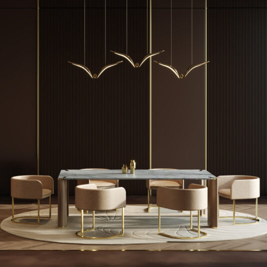 Modern Leather Tub Style Dining Chair A modern dining room features a marble-topped table, six modern leather tub-style dining chairs with gold legs, a round rug, and three gold bird-shaped pendant lights hanging above against a dark textured wall.