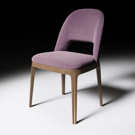 The Modern Minimalist Dining Chair features a curved wooden frame, purple upholstered seat and backrest with a cut-out below the backrest, all set against a dark background.