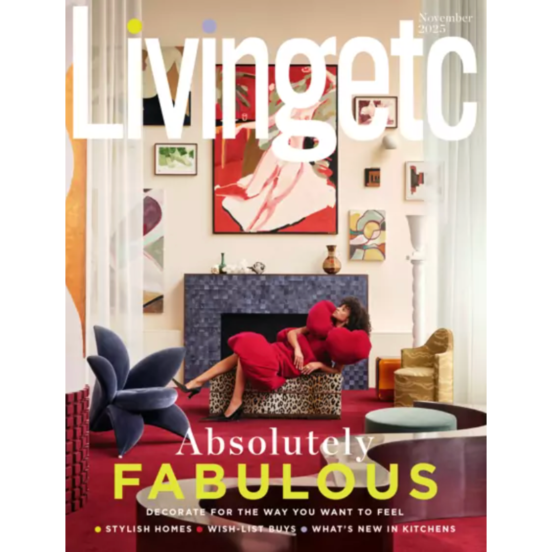 The cover of Livingetc magazine shows a woman in a red dress lounging on a patterned chair in a colourful, modern living room with art on the walls and bold, stylish décor. The headline reads 'Absolutely Fabulous.'