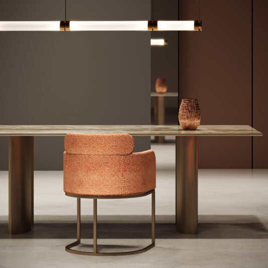 Contemporary Rectangular Faux Marble Dining Table A stylish space with a Contemporary Rectangular Faux Marble Dining Table, textured orange chair with gold frame, decorative vase, minimalist lighting, and a backdrop of brown and grey walls accented by a mirror.