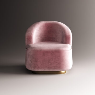 The Modern Velvet Occasional Chair in pink boasts a plush, rounded backrest and seat, set on a gold base for a chic look against any neutral backdrop.