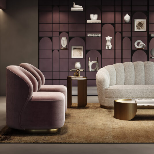 Modern Velvet Occasional Chair A modern living room featuring the Modern Velvet Occasional Chair in mauve, a white curved sofa, round coffee tables, a tan rug, and a geometric-shelf decorative wall displaying art pieces and books.