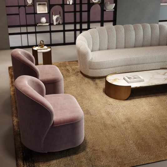 A modern living room with a curved white sofa, two mauve Modern Velvet Occasional Chairs, a beige rug, marble coffee table with books, a small side table, and a decorative shelf with ornaments in the background.