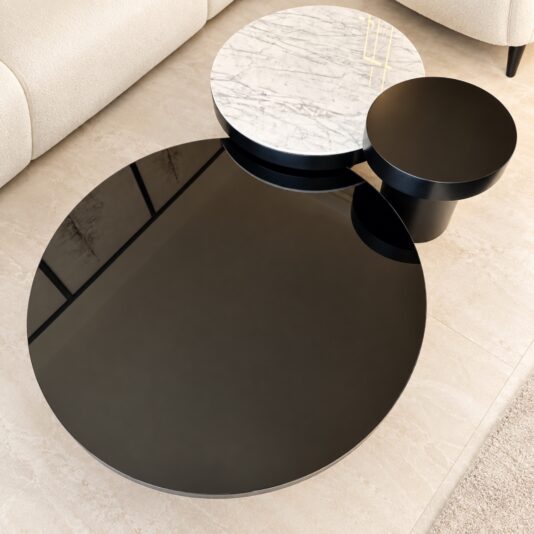 Set Of 3 Modern Round Coffee Tables Overhead view of the Set Of 3 Modern Round Coffee Tables with black glass, marble-effect porcelain and black lacquer finishes in a neutral interior.