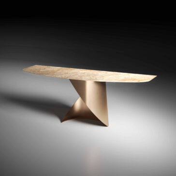Contemporary Marble Console Table The Modern Marble Console Table features a curved marble top and geometric metallic base, with clean lines and a sculptural contemporary design. Set against a dark gradient background, it creates a striking modern statement.