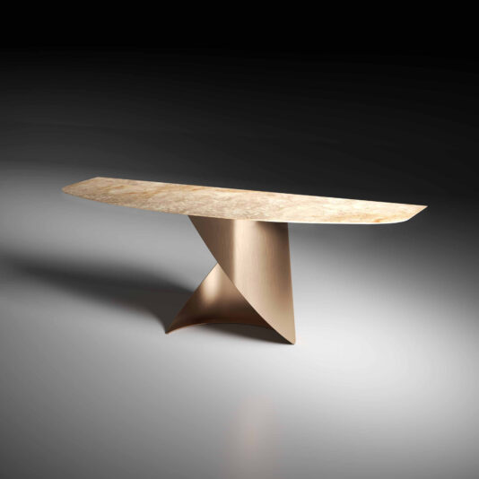The Modern Marble Console Table features a curved marble top and geometric metallic base, with clean lines and a sculptural contemporary design. Set against a dark gradient background, it creates a striking modern statement.