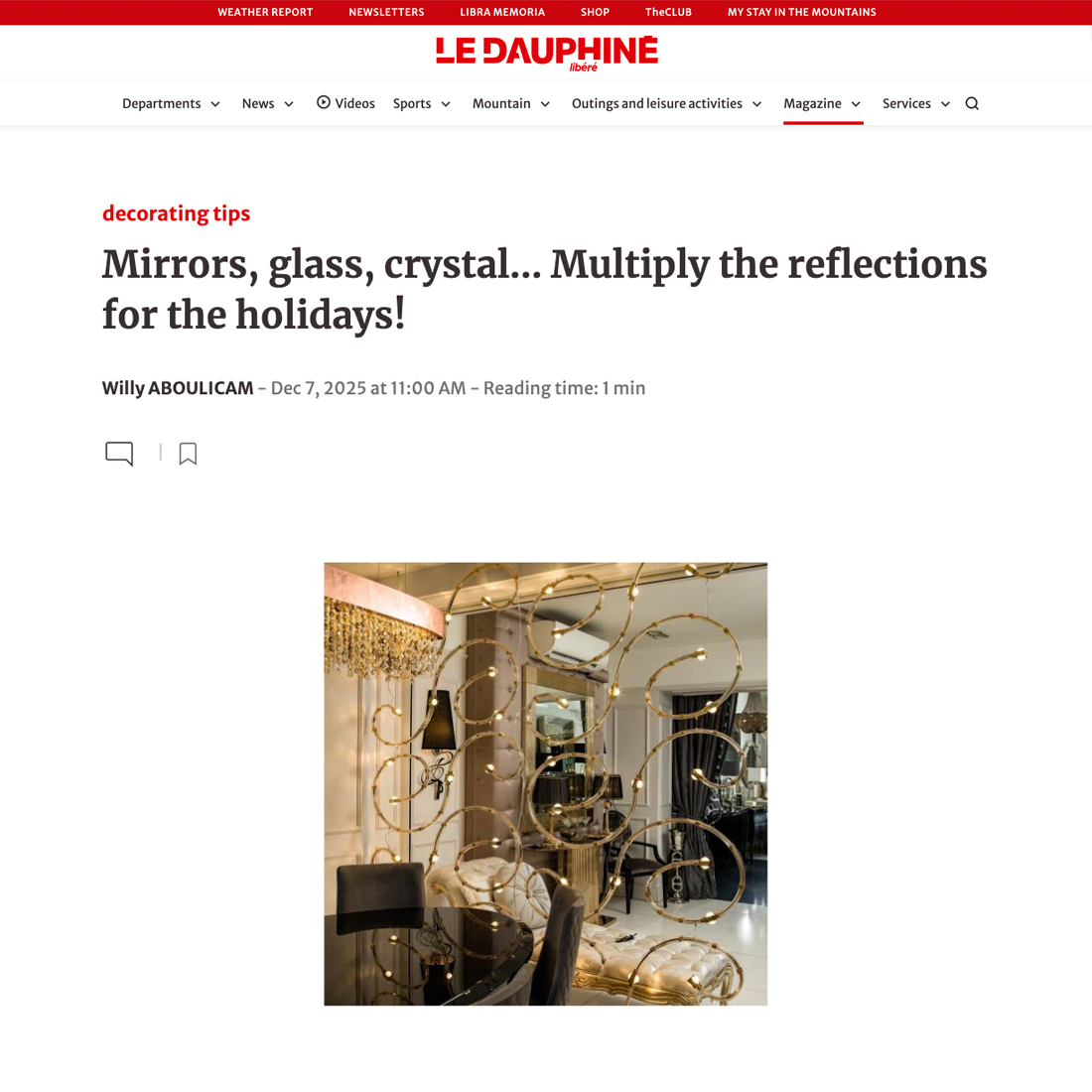 A modern living room with a large mirror, glass and crystal decor, and holiday fairy lights reflecting in the mirror, featured in an online magazine article on decorating tips.