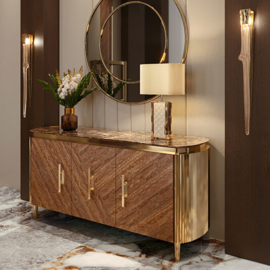 Luxury Hand-Stitched Leather Table Lamp A modern entrance showcases a wood and gold sideboard with a marble top, topped with the Luxury Quilted Faux Leather Table Lamp and a vase of flowers. A round mirror and two wall lights add warmth, whilst elegant marble flooring completes the look.