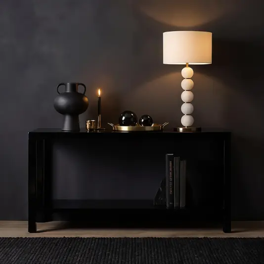Elegant 5-Globe Tiered Table Lamp providing ambient lighting on a minimalist wooden side table.