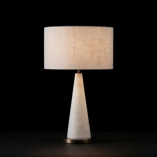 Alabaster conical table lamp featuring a smooth natural stone shade and minimalist base