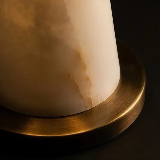 Elegant conical table lamp crafted from translucent alabaster stone for soft, diffused ambient lighting.