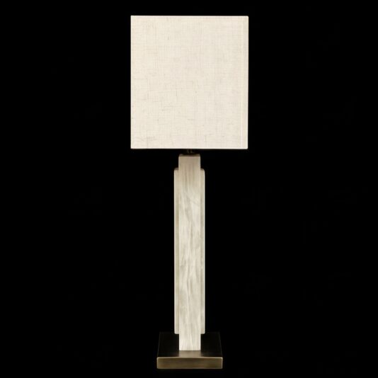 The Opal Rectangle Step Table Lamp boasts a tall rectangular marble base paired with a square off-white fabric shade, creating an elegant contrast against its bold black background.