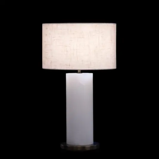 Frosted round cylinder table lamp featuring a smooth, minimalist glass shade for soft, even illumination.
