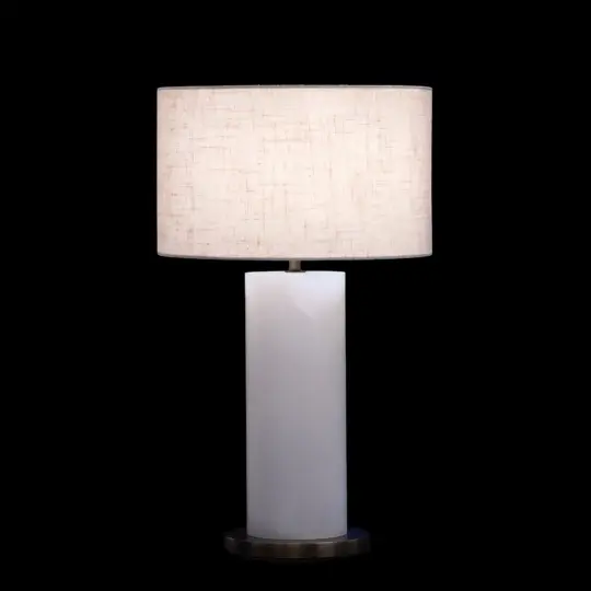 Frosted round cylinder table lamp featuring a smooth, minimalist glass shade for soft, even illumination.