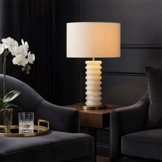 Elegant ribbed opal table lamp with a classic cylindrical silhouette, perfect for sophisticated interiors.